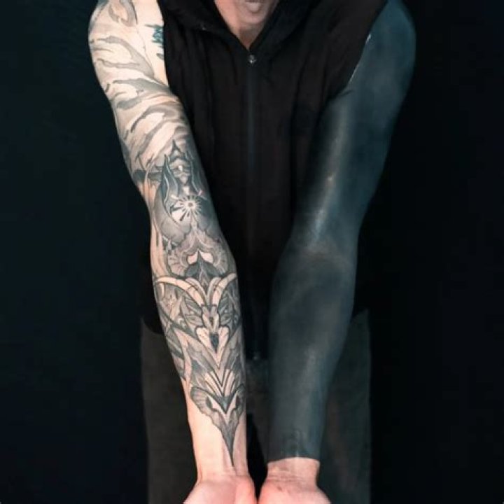 Unveiling The Dark Art Of Blackout Tattoos